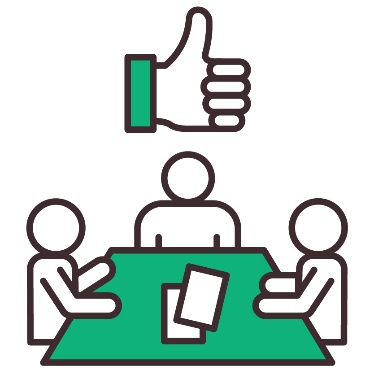 3 people sitting at a table with a thumbs up icon above.